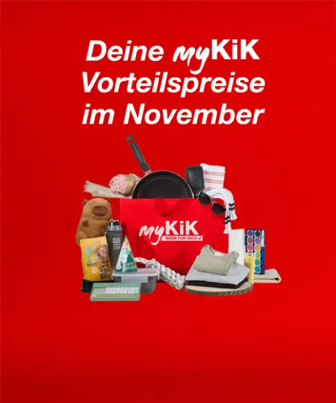 Ein leuchtend roter Hintergrund präsentiert eine myKiK-Tasche, die mit verschiedenen Produkten gefüllt ist und für die Rabatte im November wirbt. Der Text ist fett gedruckt, um das Angebot hervorzuheben.